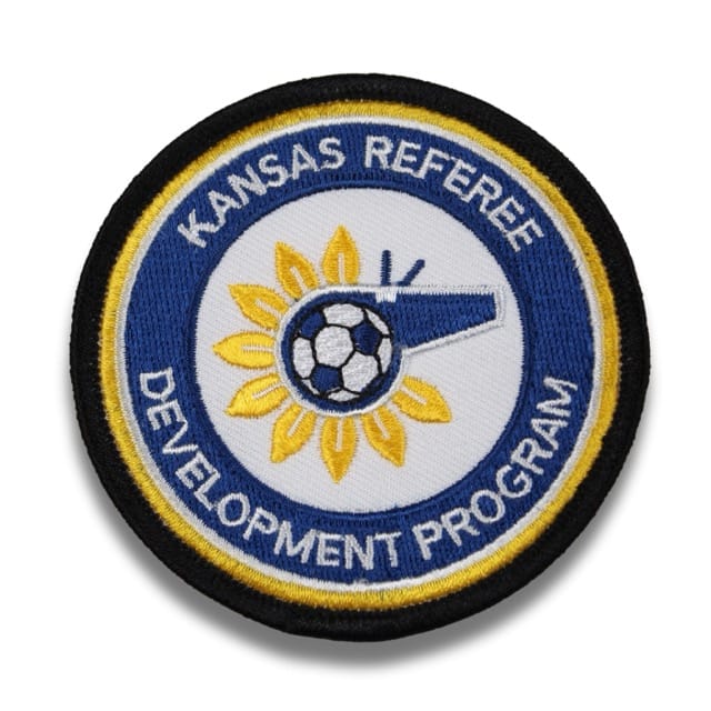 custom soccer ball patch with yellow and blue in the background